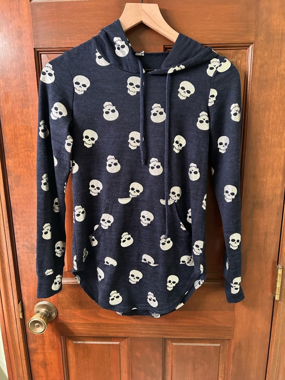 Source Unknown Awesome Navy Hoodie with Silver Skull Print. No size tag.